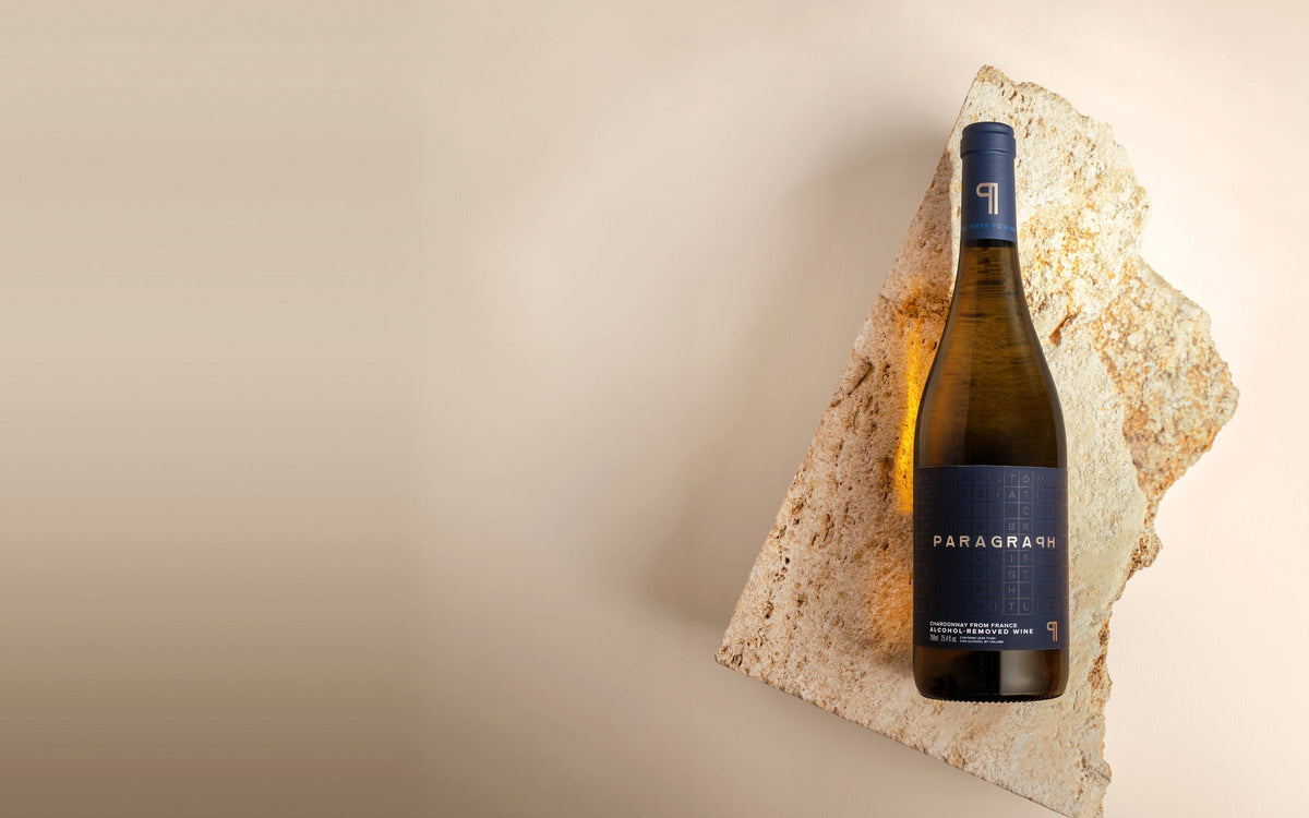 A bottle of PARAGRAPH Chardonnay on limestone